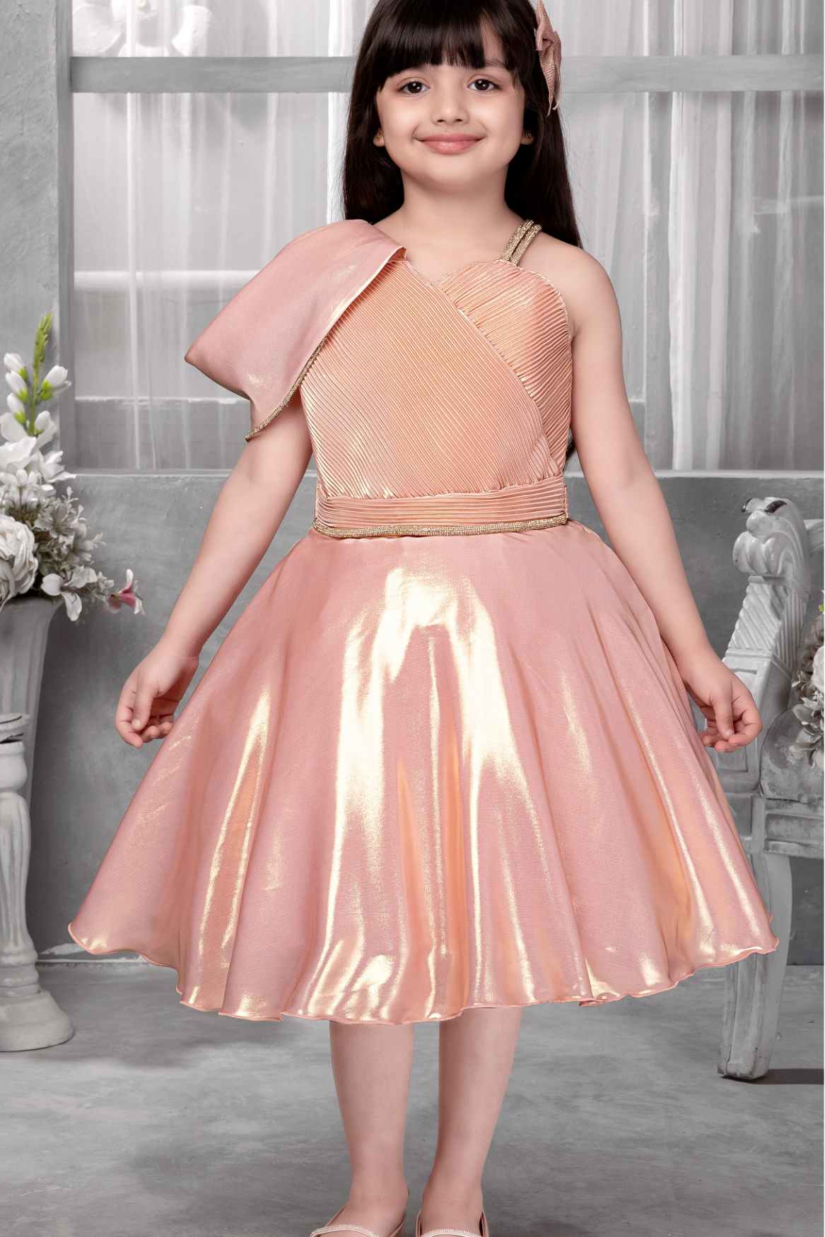 Shimmery Peach One-Shoulder Party Wear Frock With Draped Detail For Girls