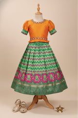 Yellow And Green Printed Silk Pattu Pavadai For Girls
