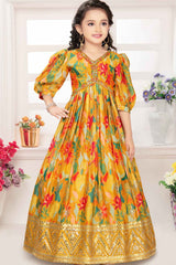 Elegant Mustard Printed Gown With Mirror Work For Girls