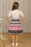 Stylish Beige And Pink Printed Frock With Sling Bag For Girls