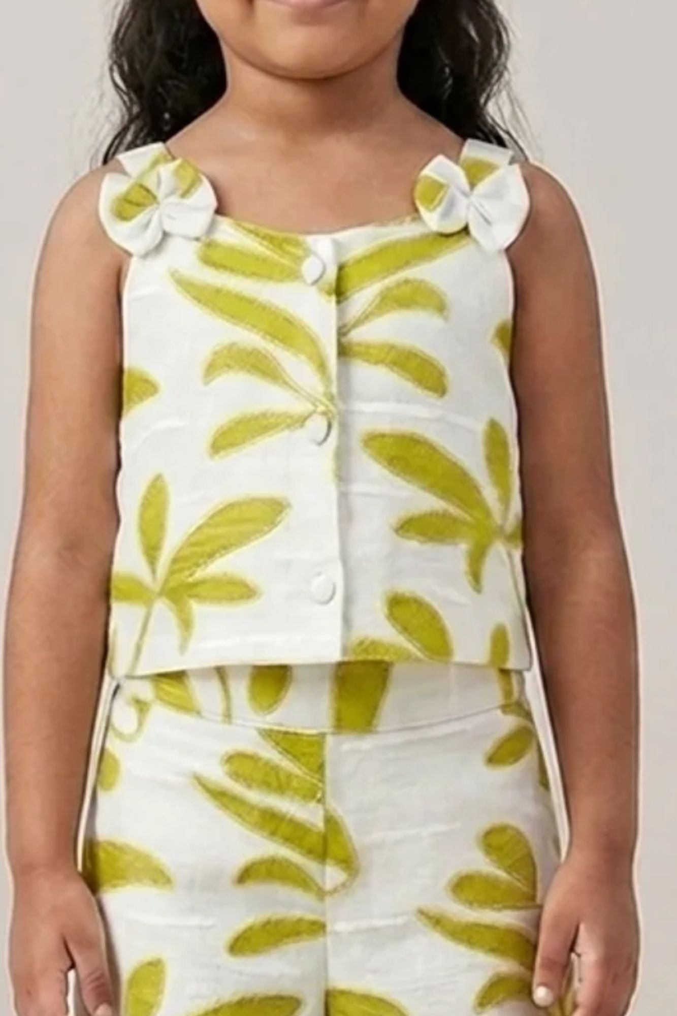 Girls White And Green Floral Printed Co-Ord Set with Sleeveless Bow Strap Top And Flared Pants