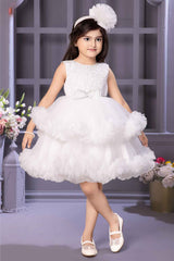 White Sleeveless With Pearl Work And Bow Embellishment Layer Frock For Girls