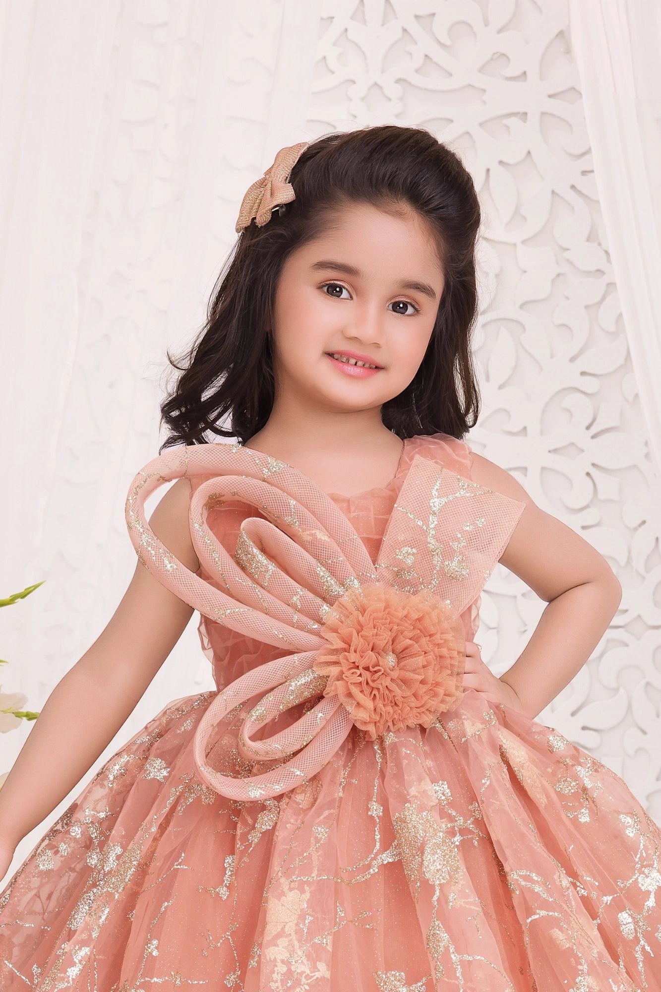 Peach Shimmer Party Gown with Oversized Bow & Floral Accent For Girls