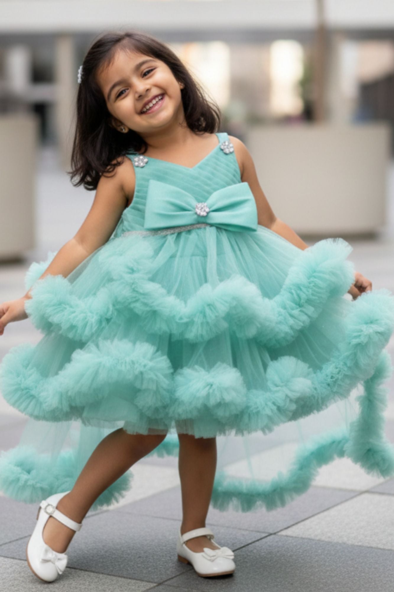 Green High-Low Party Wear Tulle Frock with Bow Detail For Girls