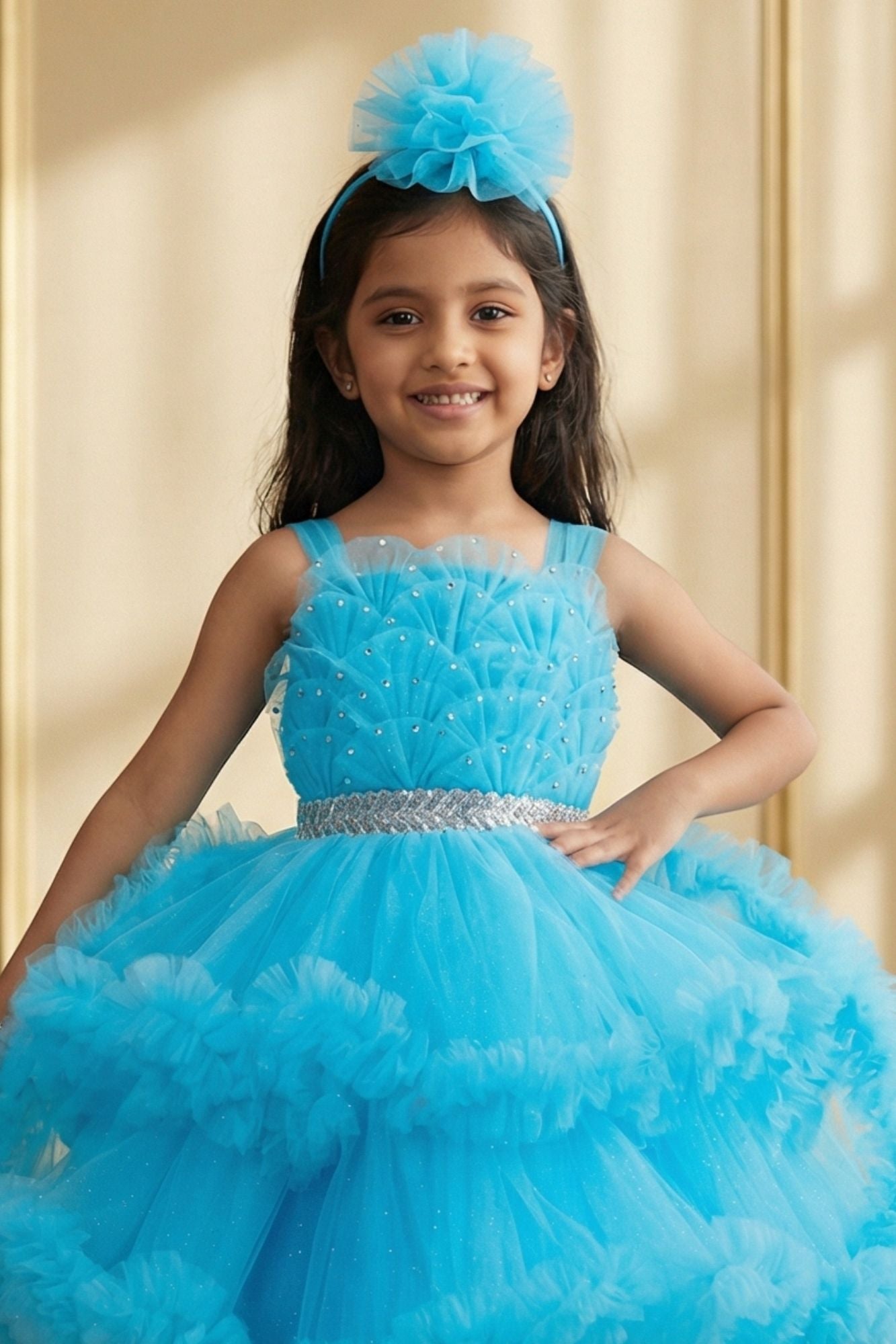 Girls Sky Blue High-Low Party Frock with Ruffled Layers And Embellished Waistbelt