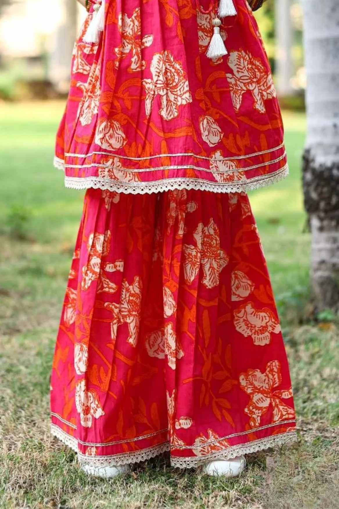Red Floral Printed Sharara Set with Embroidered Yoke and Tassel Tie-Ups For Girls