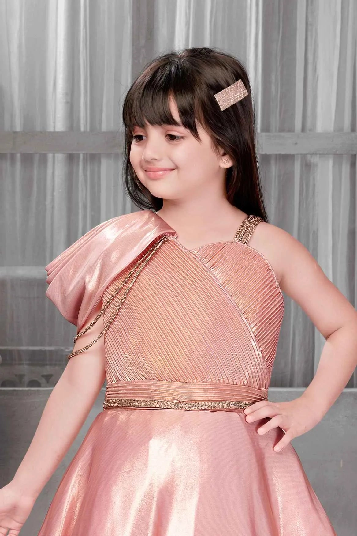 Shimmery Peach One-Shoulder Party Wear Gown With Draped Detail For Girls