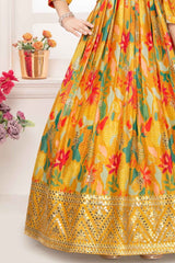 Elegant Mustard Printed Gown With Mirror Work For Girls