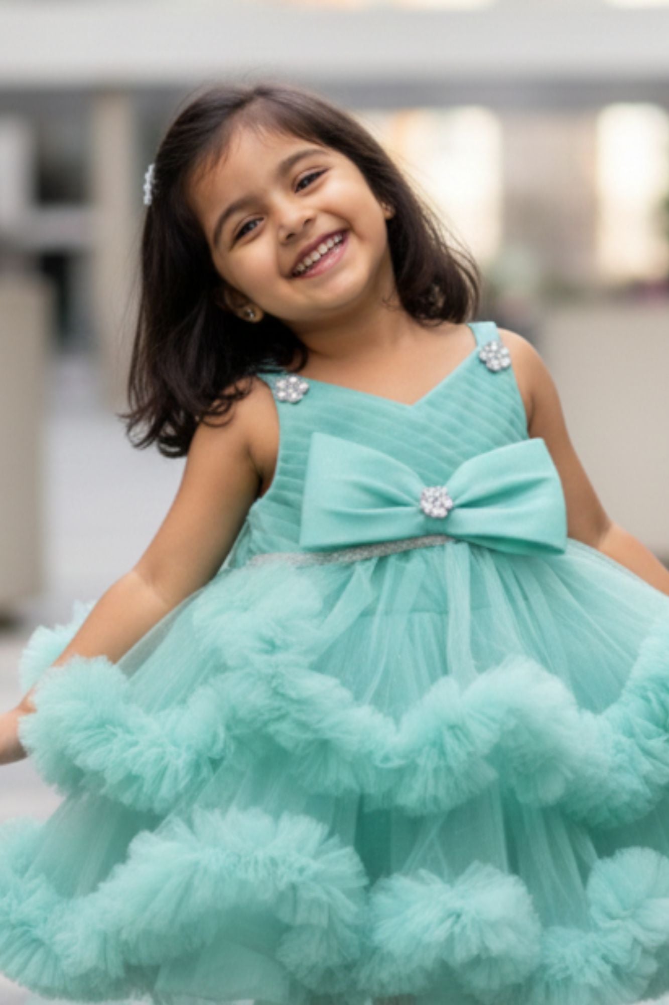 Green High-Low Party Wear Tulle Frock with Bow Detail For Girls
