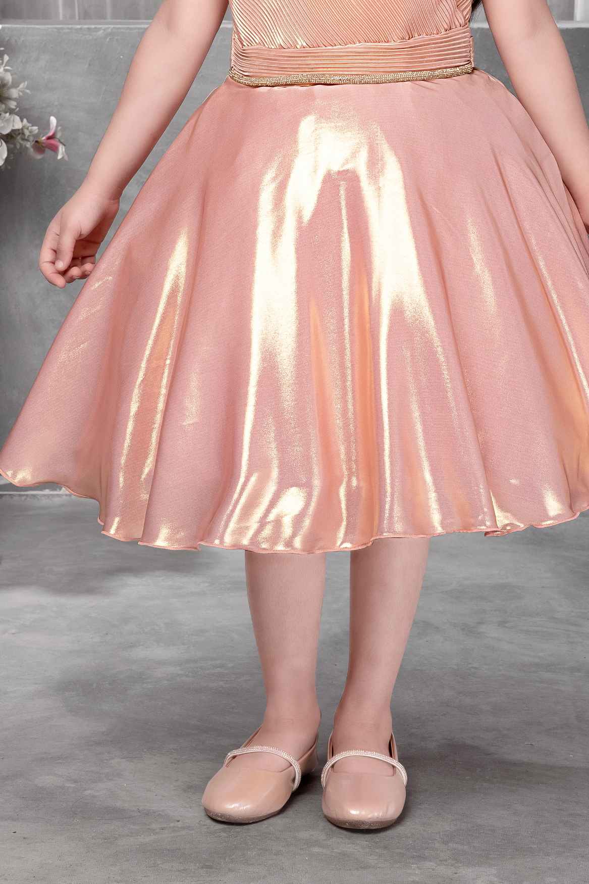 Shimmery Peach One-Shoulder Party Wear Frock With Draped Detail For Girls
