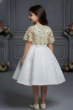 Ivory Party Frock with Gold Embellished Shrug And Bow Waist Accent For Girls