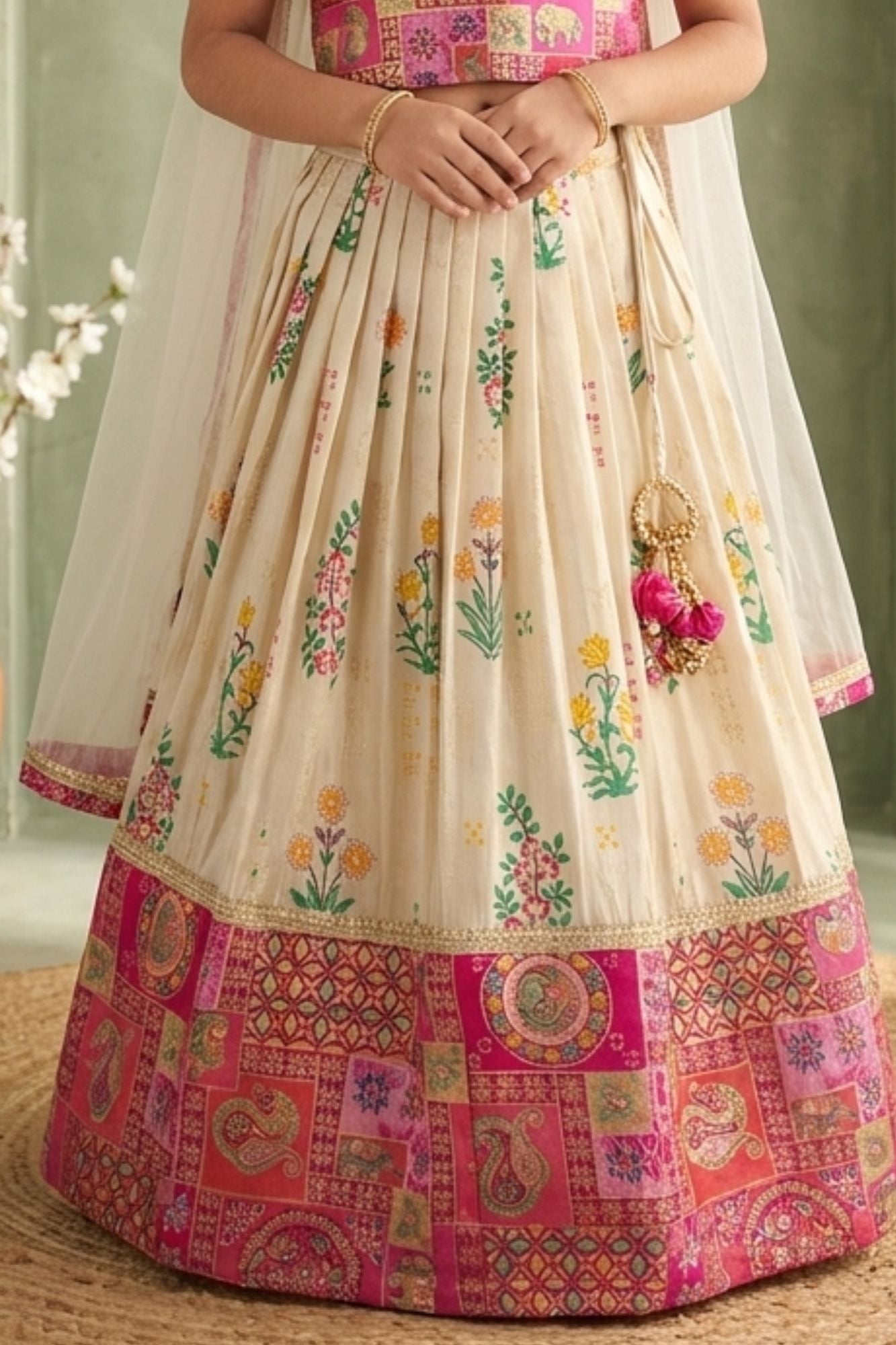 Girls Cream and Rani Pink Printed Lehenga Choli Set with Dupatta