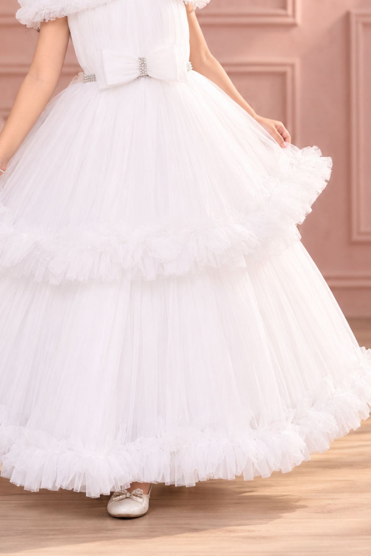 White Net Gown With Ruffled Sleeves For Girls