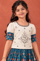 Ivory And Teal Blue Silk  Pattu Pavadai For Girls