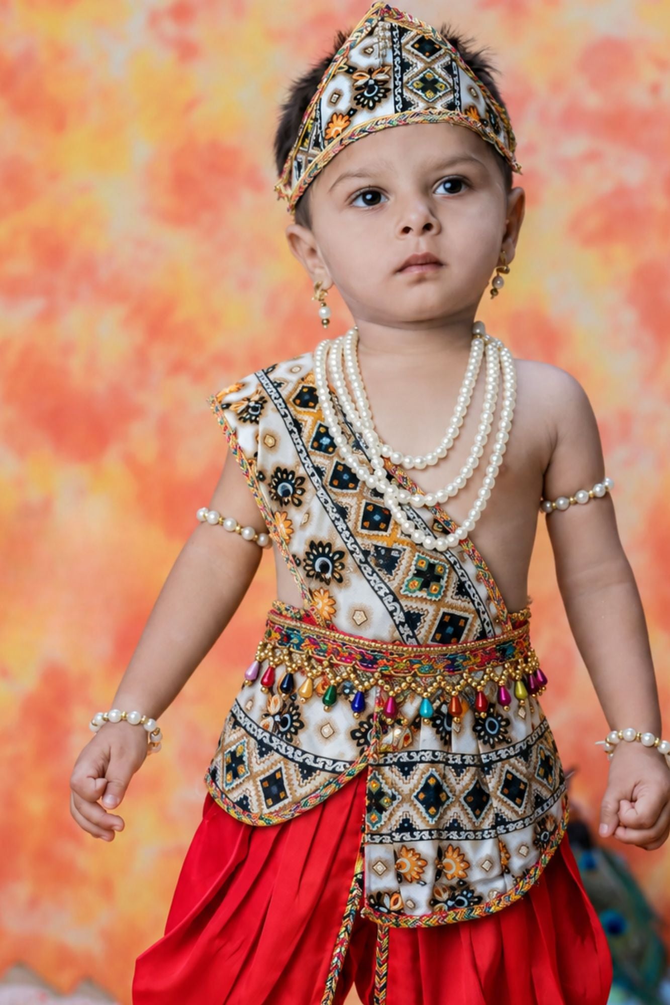 Boys Red Geometric And Floral Printed Krishna Dhoti Set with Accessories