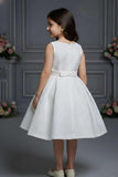 Ivory Party Frock with Gold Embellished Shrug And Bow Waist Accent For Girls