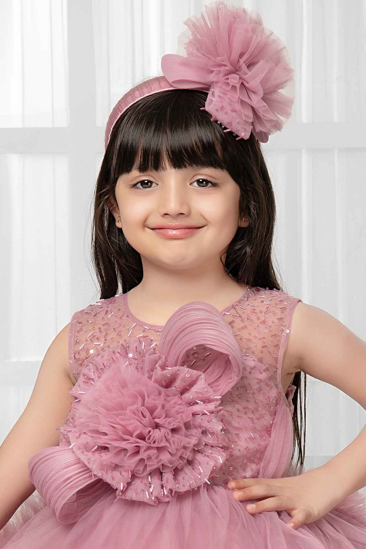 Onion Pink Sleeveless And Sequins Work With Floral Embellished Tail Back Frock For Girls