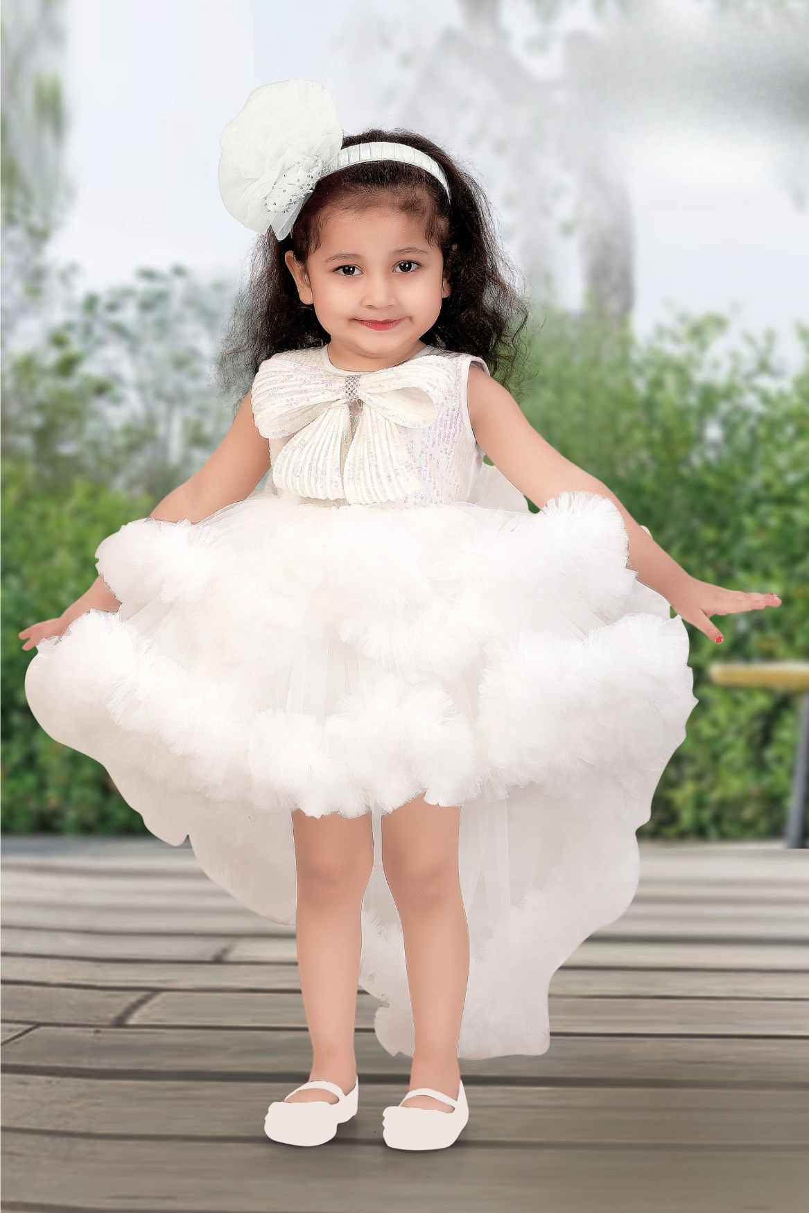 White Ruffle Party Tailback Frock With Sequin Work Oversized Bow For Girls