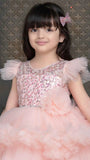 Peach Shimmer Tailback Party Wear Frock With Floral Embellishment For Girls
