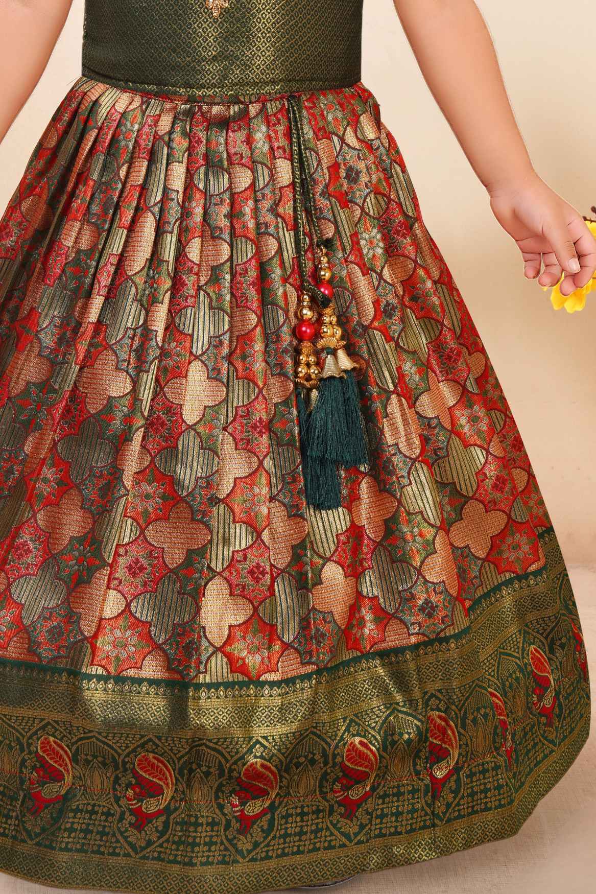 Green Brocade Pattu Pavadai With Bead Work And Zardosi Work For Girls