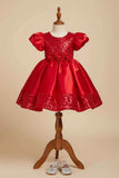 Red Sequin Party Wear Frock with Puffy Sleeves and Floral Waist Detail For Girls