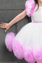Cute White Tutu Frock With Pink Flower Embellishments And Ruffled Sleeves - Lagorii Kids