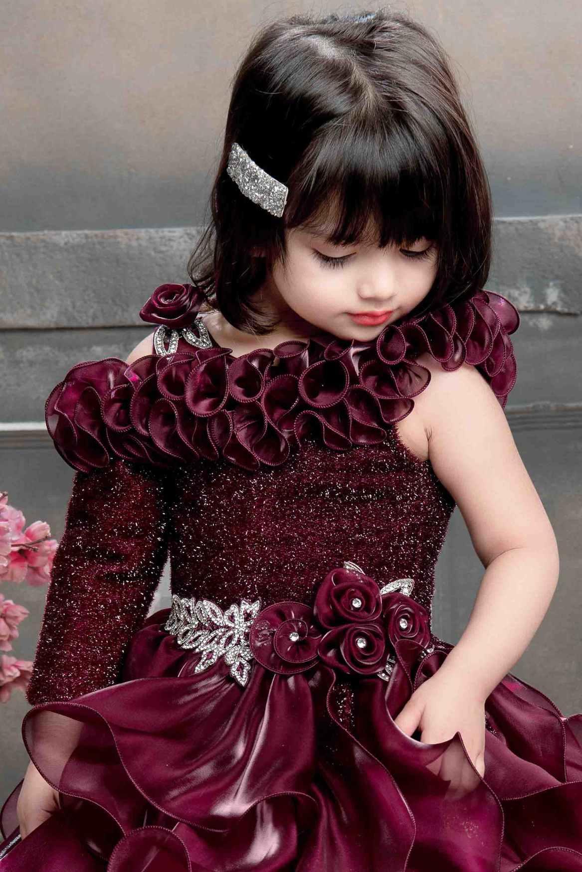 Designer Multilayer Ruffled Maroon Gown With Floral Embellishments For Girls - Lagorii Kids