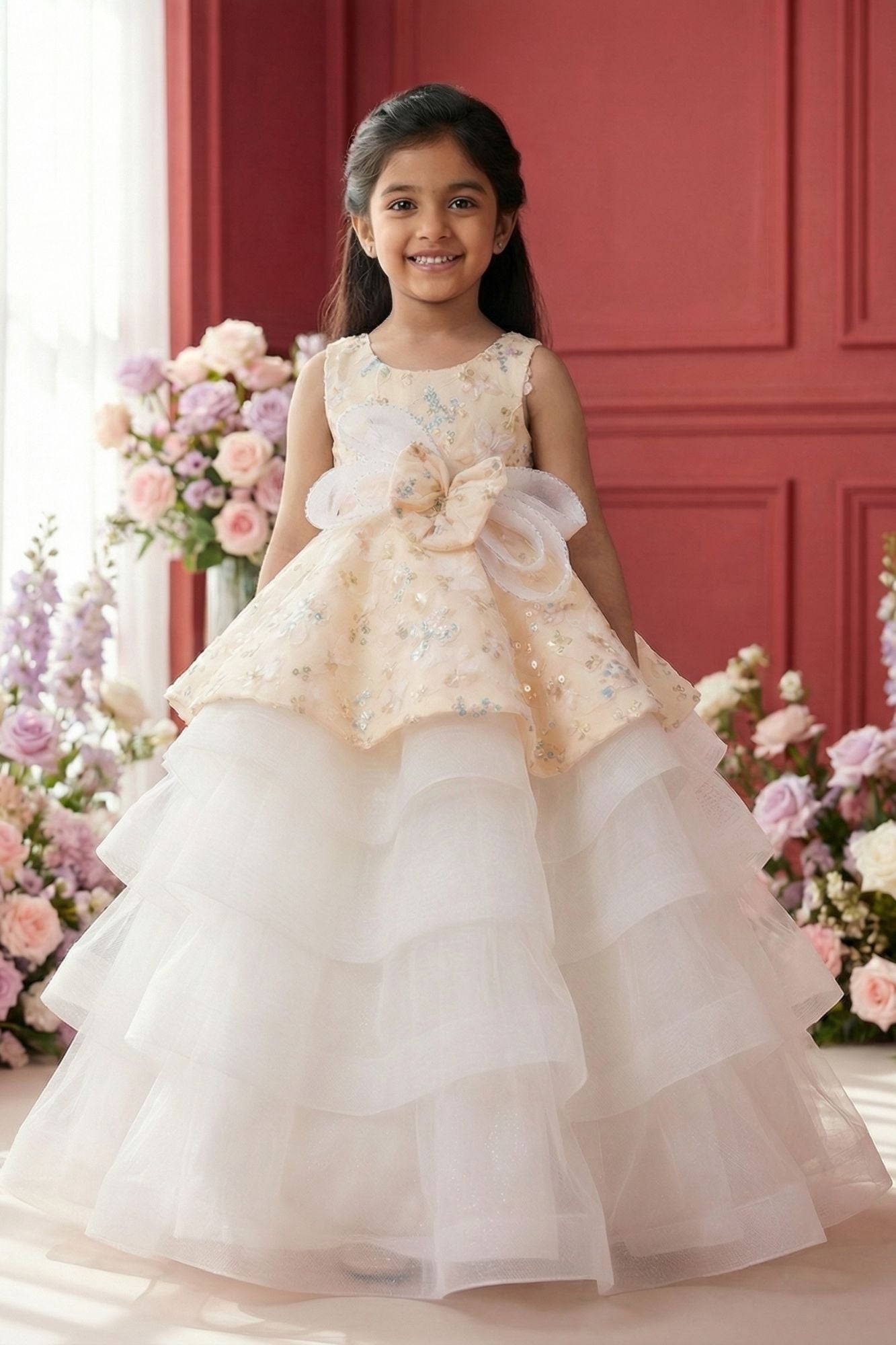 Girls Cream Layered Party Wear Gown with Floral Embroidery And Statement Bow