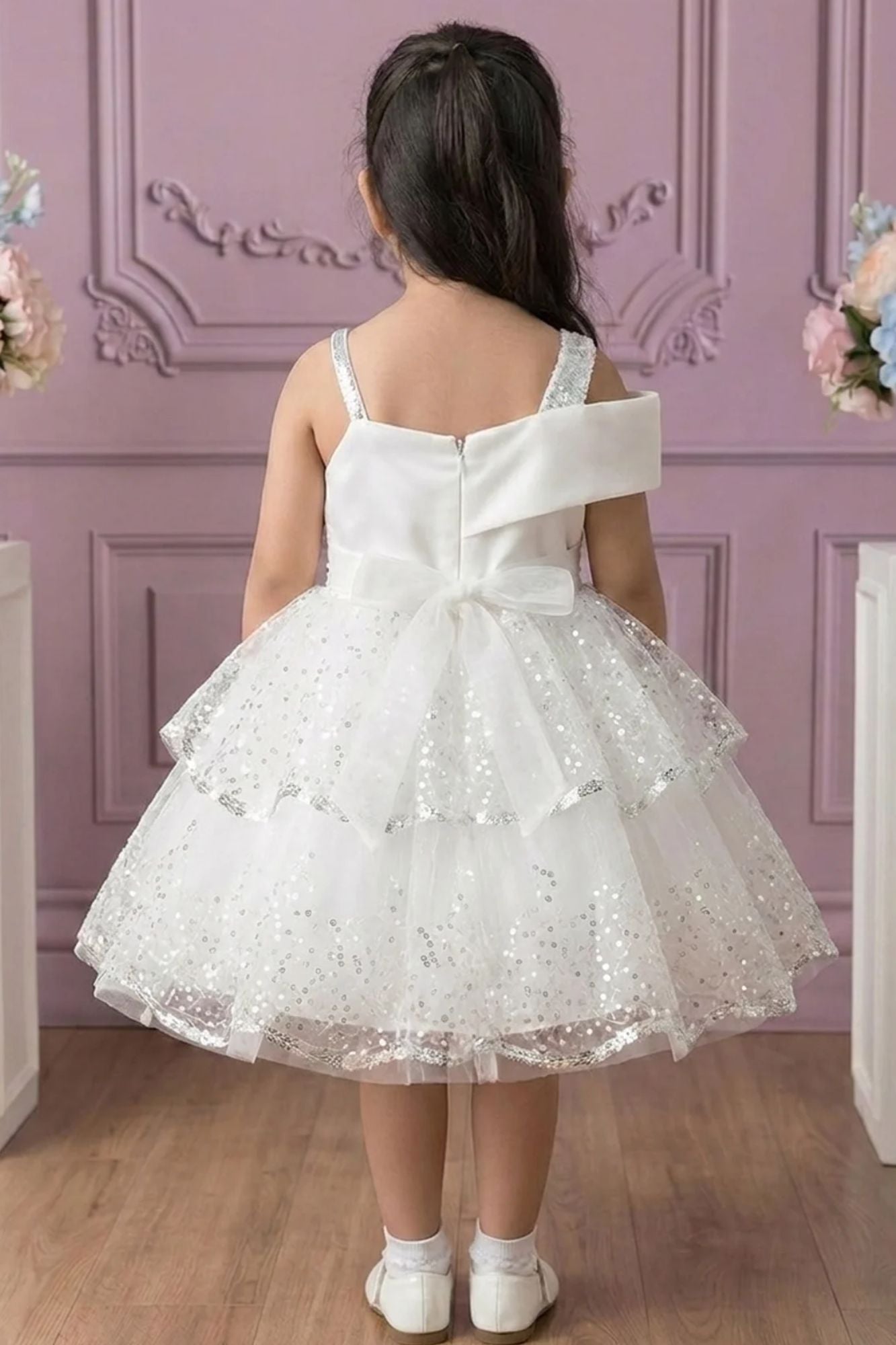 White Sequin Layered Ruffle Party Wear Frock With Statement Bow For Girls