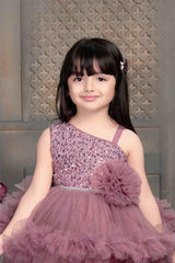 Onion pink layered frill frock with a ruffle flower at the waistline. | Tailback - Lagorii Kids