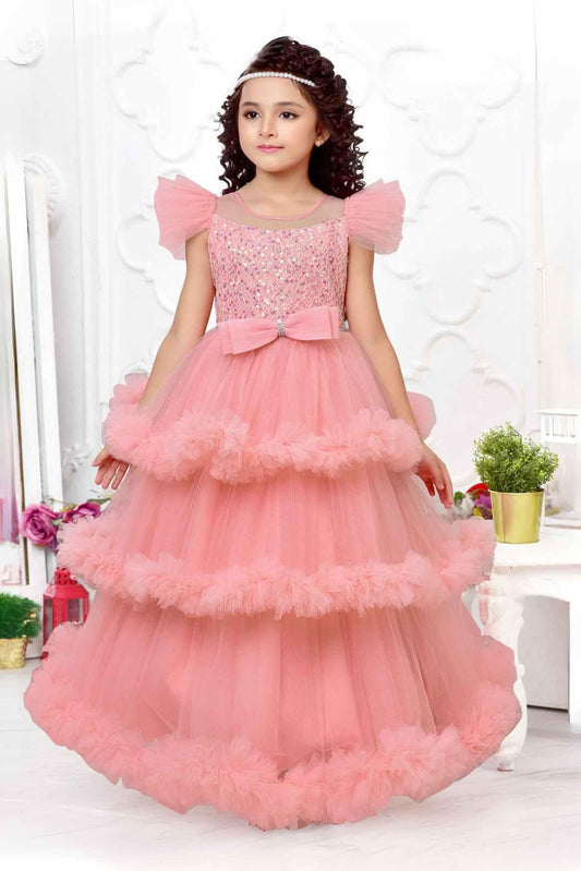 Peach Multilayered Ruffled Net Party Gown With Bow Embellishment For Girls - Lagorii Kids