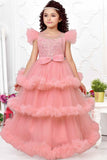 Peach Multilayered Ruffled Net Party Gown With Bow Embellishment For Girls - Lagorii Kids