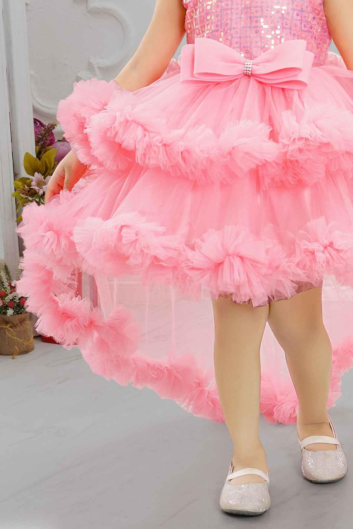 Pink Shimmer Net Tailback Frock With Bow Embellishment For Girls - Lagorii Kids