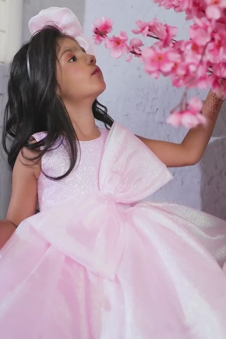 Pink Shimmer Organza Frock With Bow Embellishment For Girls