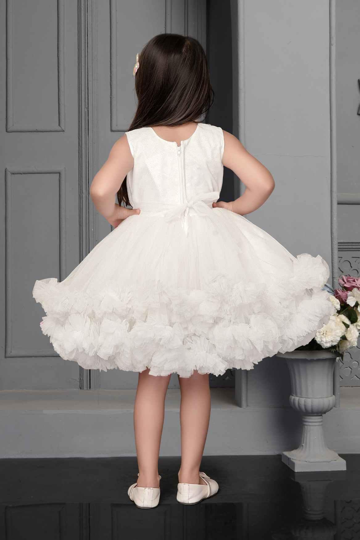 White Ruffle Frock With Floral Embellishment For Girls - Lagorii Kids