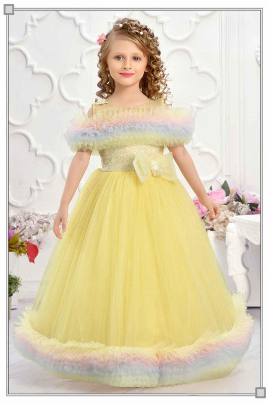 Yellow Ruffle Net Gown With Bow Embellishment For Girls - Lagorii Kids