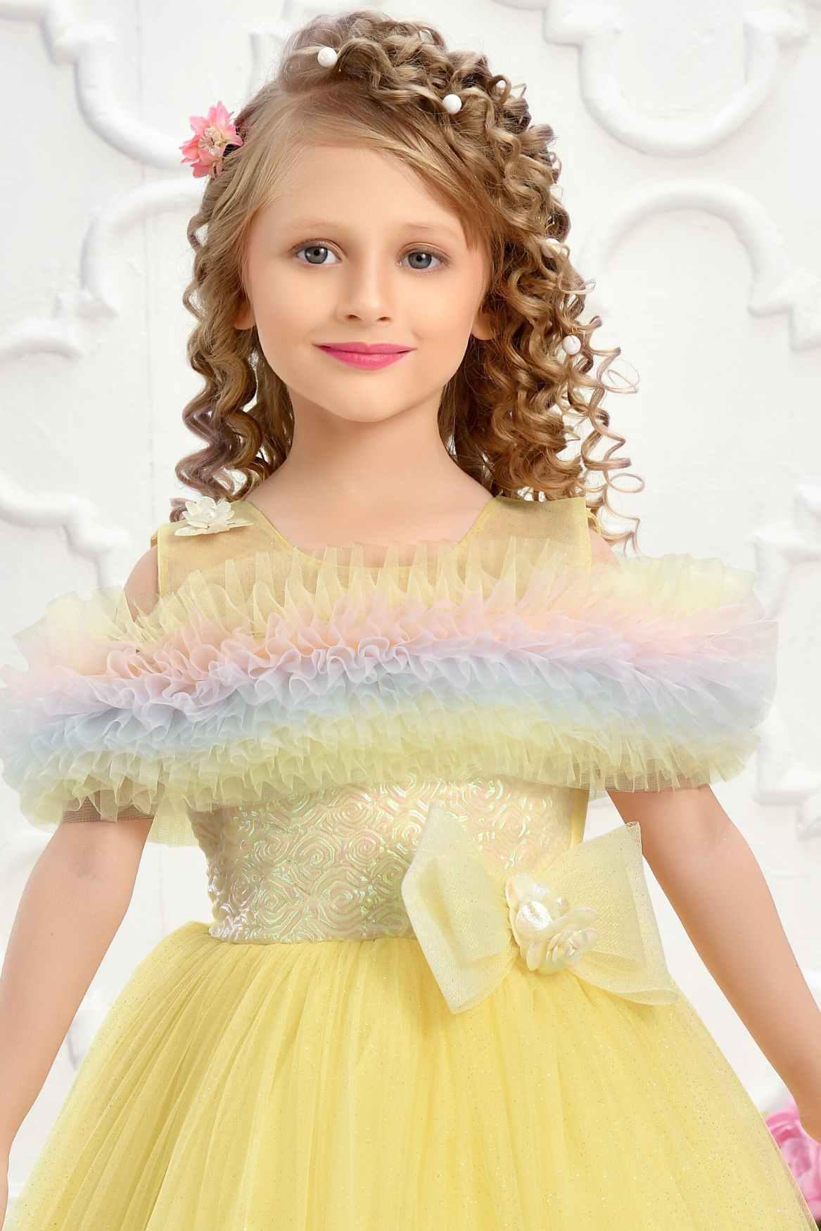 Yellow Ruffle Net Gown With Bow Embellishment For Girls - Lagorii Kids