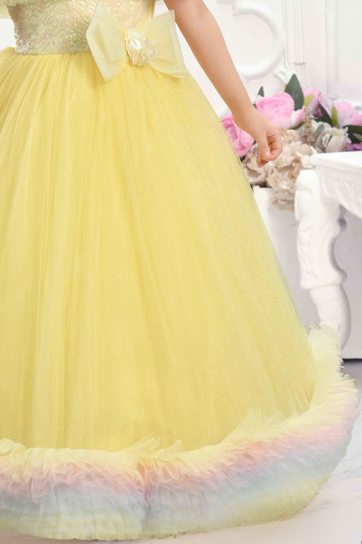 Yellow Ruffle Net Gown With Bow Embellishment For Girls - Lagorii Kids