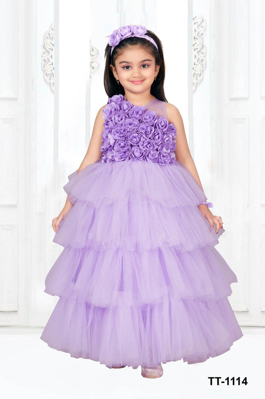 Lavender multilayered frilled gown with rose surface embellishment. - Lagorii Kids